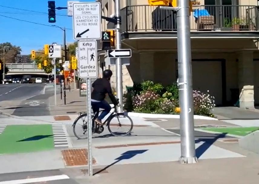 A cyclist on the Main Street cycle track wanting to make a left turn must first pull off from the