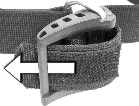 1. While firmly holding the metal D-ring with your left hand, rotate the buckle back towards the webbing.