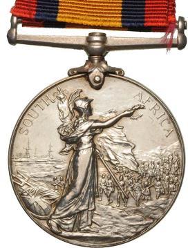 REVERSE Britannia is depicted holding the Union Flag in her left hand and a laurel wreath in her right hand.
