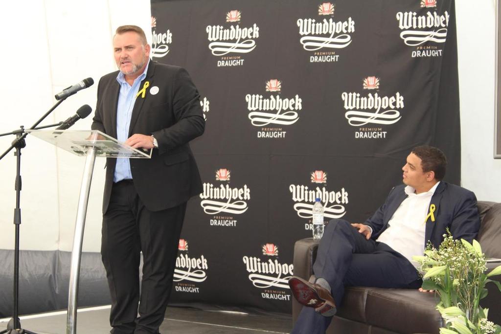 Managing Director of Namibia Breweries Limited (NBL) a subsidiary of the O&L Group, Wessie van der Westhuizen (left) speaks at