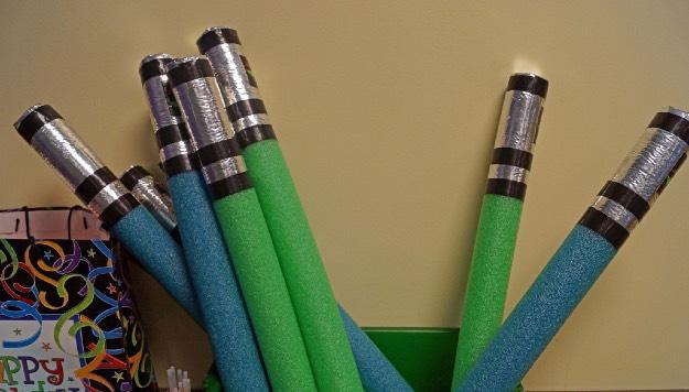 Star Wars Theme Party #TheLightSideofTheDarkSide Light Sabers Ready, and go!