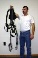 DONNING THE REVOLUTION WITHOUT BELT 1 Hold harness by back D-ring.
