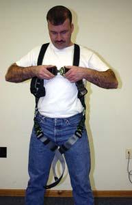 The shoulder strap retainer (chest strap) must be positioned in the mid-chest area 6 to 8 below