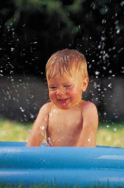 Splashing into summer. Water sports, swimming pools and going to the beach are some favorite summer activities for children.