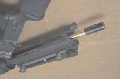 Remove the inner barrel by sliding it through the upper receiver, towards the rear of the gun.