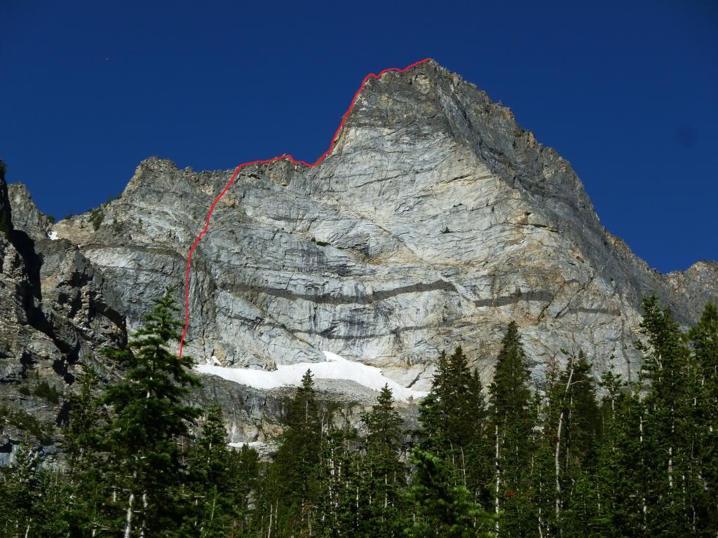 are easy and go to a notch below the SE arête. It is possible to walk off the route at this point and enter the Goat Peak basin.