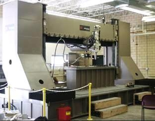 This system is a 5-DOF system capable of producing parts requiring multi-axis welding capability.
