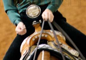 Hands With Split Reins: One finger between is permitted Not with romal Tail of reins on