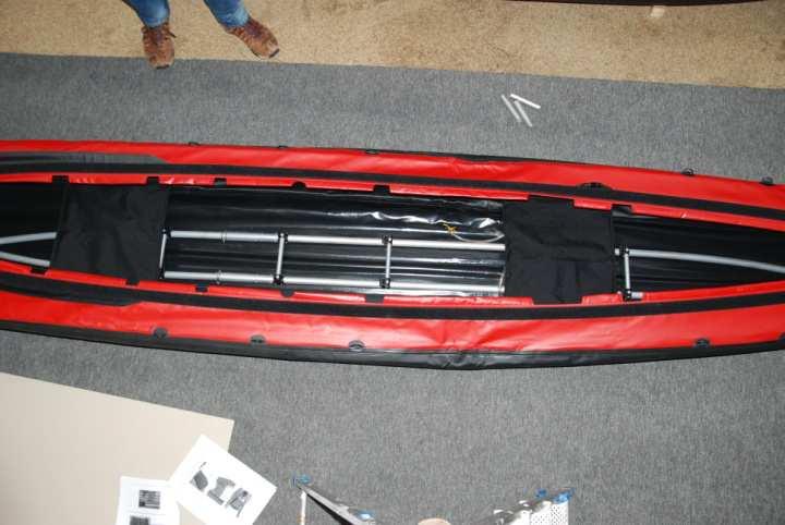 It might help to slightly press the two stringer elements inside the boat, in order to place the seat easier.