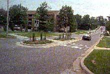 Advantages: Effectively reduces speeds; reduces left turn accidents; can be visually attractive. Disadvantages: Placement of circle may require parking removal. Traffic Circle XVI.