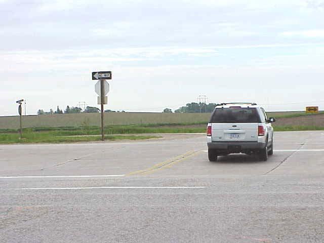 Figure 2-8. Rural median with double yellow and stop bar in the median crossover (source: Iowa DOT) Figure 2-9.