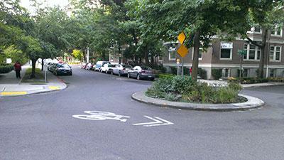 This is accomplished through traffic calming measures and special