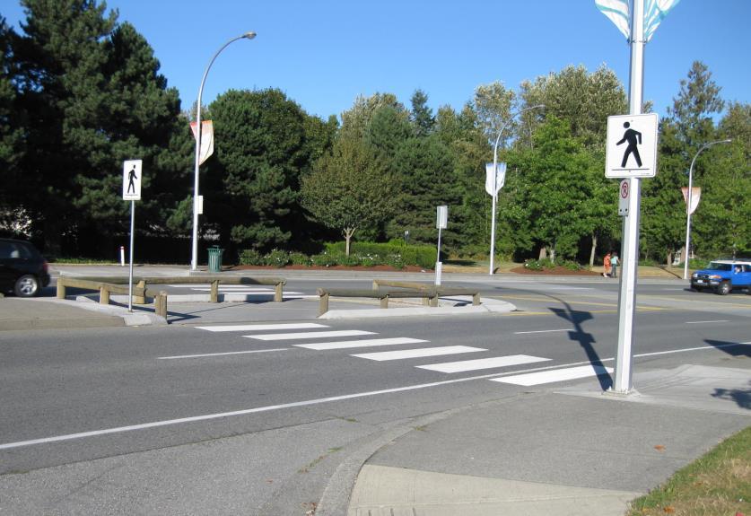 Two Stage Crosswalks Safety Benefits: Reduces the incident for pedestrian / vehicle conflicts at the intersection as the pedestrian has separation from vehicular traffic