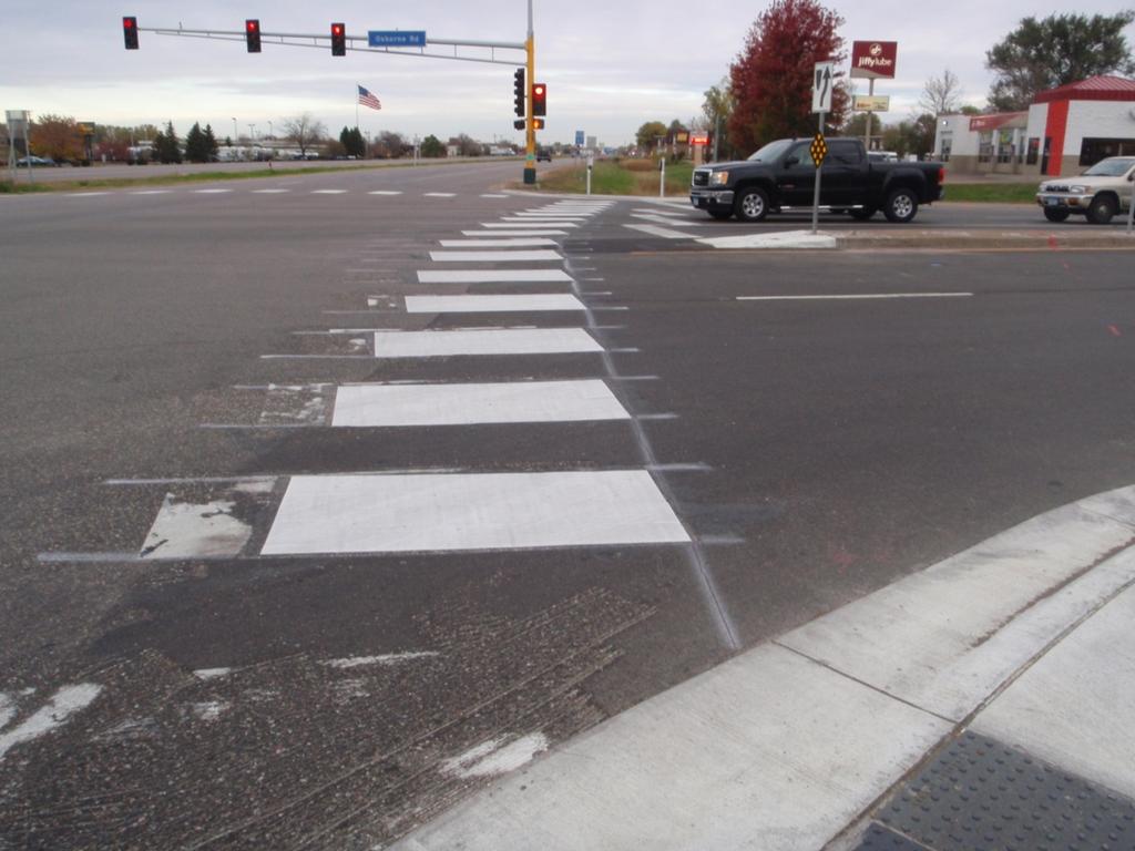(G) Pedestrian Signal Systems Crosswalks shall be striped in a straight alignment between the