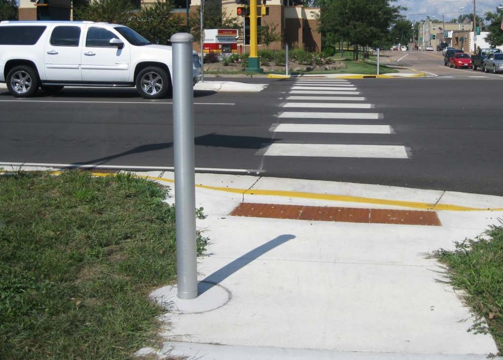 (G) Pedestrian Signal Systems Crosswalks shall be striped