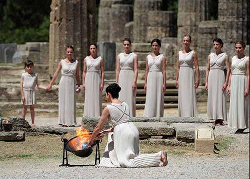 There isn t a perpetual flame in Hera s temple today. So where does the runner find the fire? One of the maidens brings out a huge bowl lined with a curved mirror.