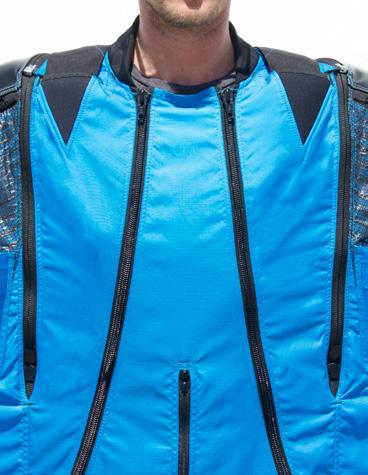 INNIE-OUTIE ZIP SYSTEM For BASE mode, you have the option of zipping the front of your harness system inside the suit: place the shoulders of your harness inside the front of the suit as shown.