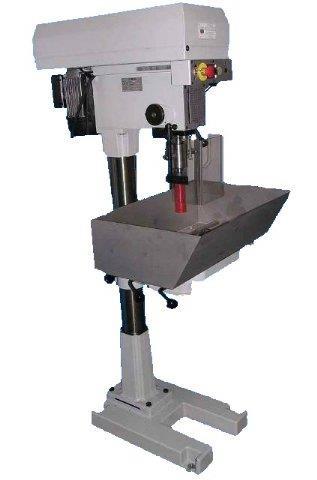 PLUGGING MACHINE The heavy built diamond tooled drill press is especially designed to drill in various size core samples.