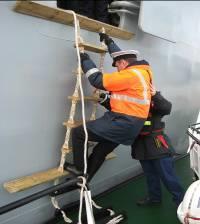 The Pilot should only embark if the top of the ladder is manned. Stepping off the pilot boat onto the ladder requires timing so as to step onto the ladder at the top of a wave or roll.