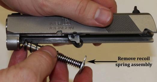 back only the recoil spring plate (Figure G), so that the recoil spring rod