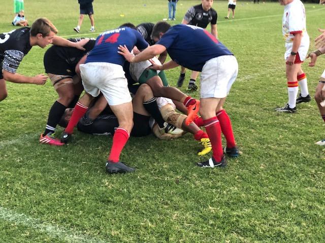 through the second half. The Trojan team played outstanding rugby, quickly scoring their own try to make the score 14-8 and from there it was anyone s game.