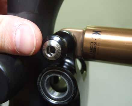 of the frame and tighten with a 10mm allen key. Torque to 35-40 in/lb. 18.