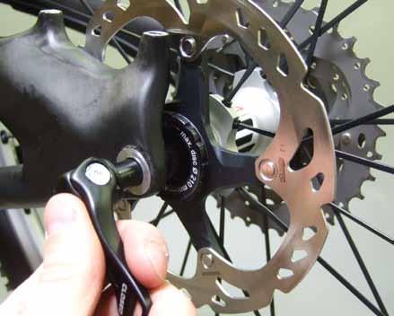 Remove the M3x5mm flat head bolt and the Shimano nut