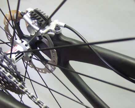There are three cable stop groups on the bottom of the top tube to which housing and brake line can be attached, each with two positions to secure housing.