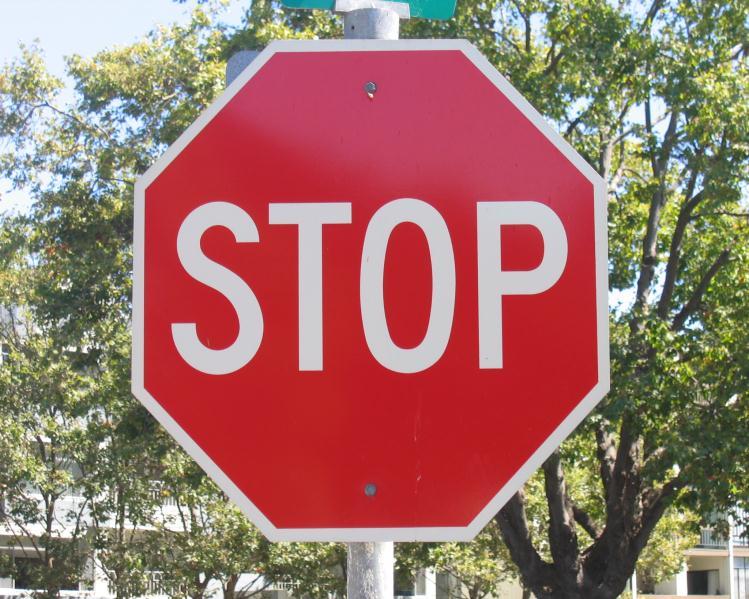 STOP SIGNS Step 2 Description: Stop signs assign right-of-way at intersections and require motorists to stop and check traffic before crossing. Advantages: Assists pedestrian and bicycle crossings.