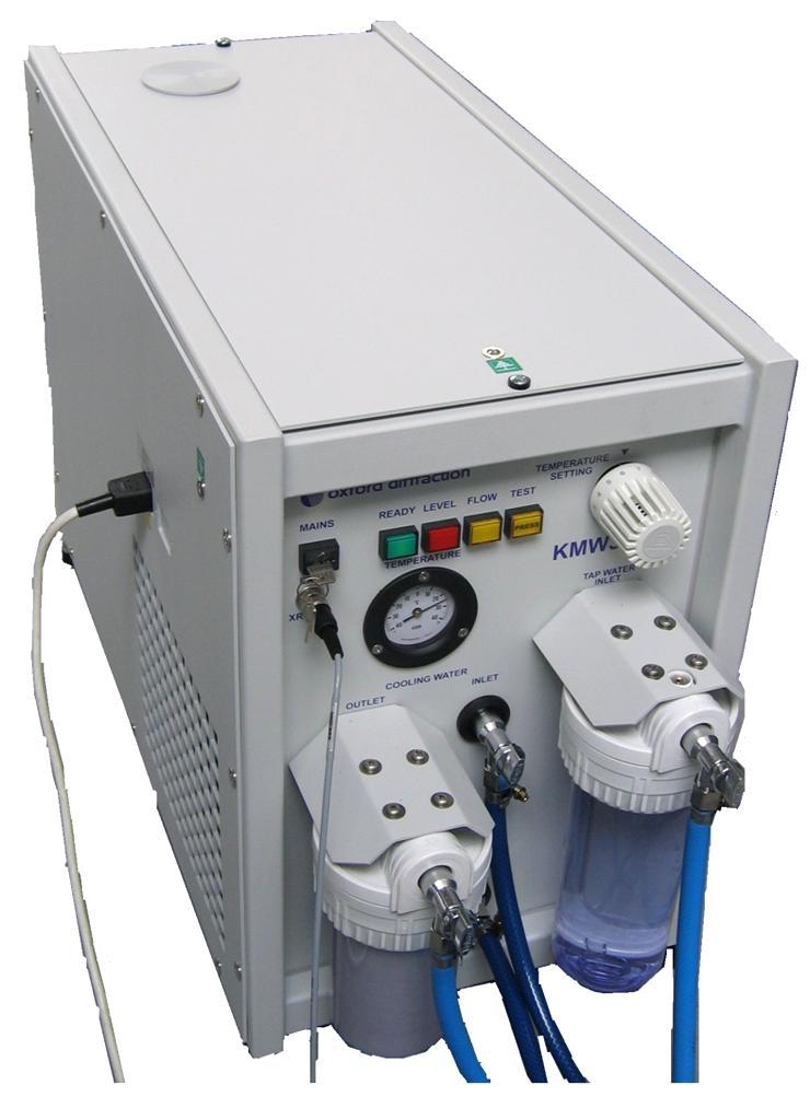 4. Technical Description 4.1 Overview TECHNICAL DESCRIPTION The KMW3000C chiller consists of a metal cabinet containing a water reservoir with heat exchange coil, and control circuitry.