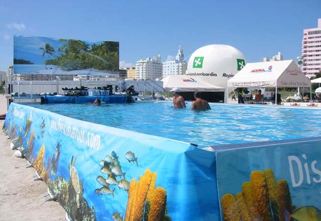 What is provided? The Scuba Tour is a self contained venue: Pool: The Pool is 20 x 40 x 4 deep 26,000 gallon Portable Splash Superpool.