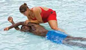 If the victim is not breathing, immediately remove the victim from the water using a technique, such as the two-person-removal-from-the-water, and provide resuscitative care.
