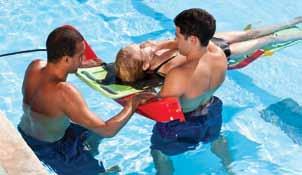 Once the backboard is in place, an assisting lifeguard then stabilizes the victim by placing one hand and arm on the victim s chin and chest, the