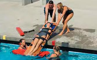 Working together as a team, other lifeguards can help by: Submerging and positioning the backboard under the victim.