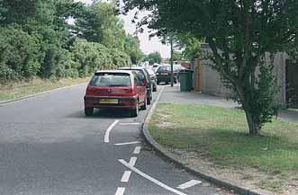 retained as clear untextured surface for cyclists 'way through' Before Suggested measure