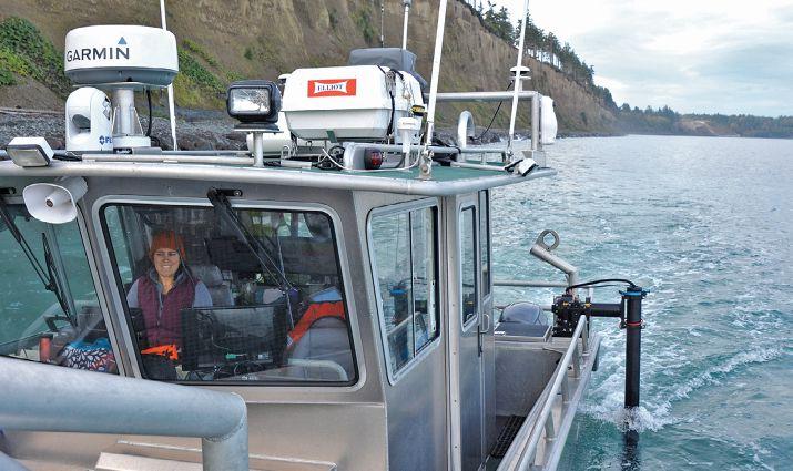 Above: CMAP crew collects intertidal beach elevation data using RTK-GPS equipment along the Elwha bluffs to ground-truth and fill in any gaps between boat-based topographic lidar and multibeam sonar