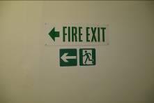 Any old or non-conforming signs should be removed when new ones are installed, this is to reduce confusion caused by having too many signs relating to exit routes.