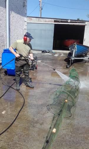 152 Photos: Fyke Nets being power washed after being seized on Lough Ennell.