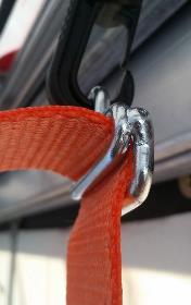 This is the Stowed position (figure 22). Figure 22. Fix tarpaulin in stowed position. Mounting of FIX Strap FIX Strap uses the same tracks and bungee suspension system as FIX Road.