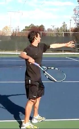Continuous Swings Stand on the baseline in a platform stance with a racquet and no ball