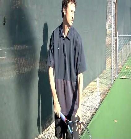 the shoulders Move the racquet towards the back fence while keeping the arms relaxed Keep looking over the non-dominant