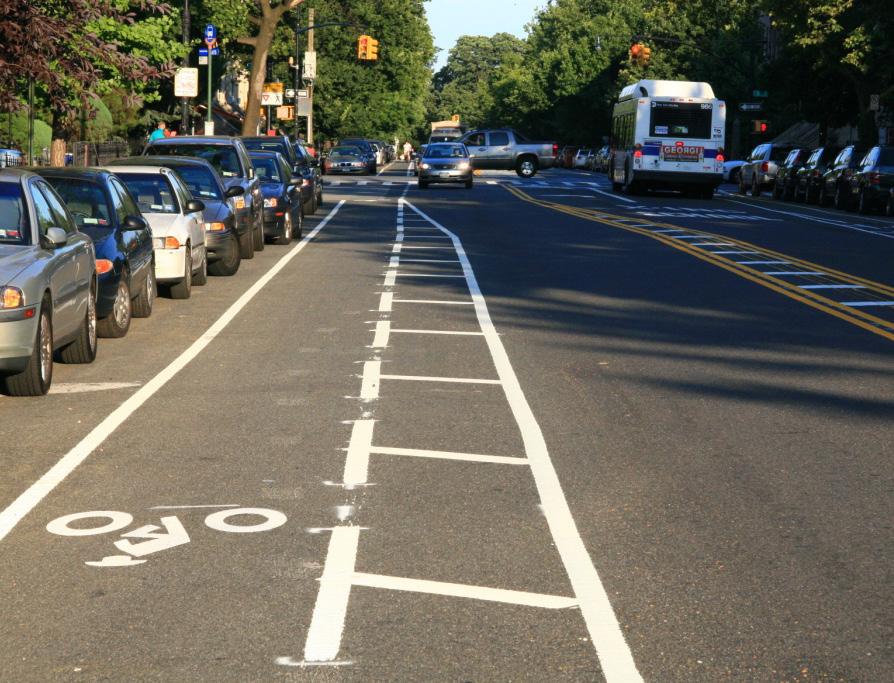 Shared lane markings are generally used where there is not enough space for separate bicycle lanes and cyclists should be encouraged to use the full traffic lane.