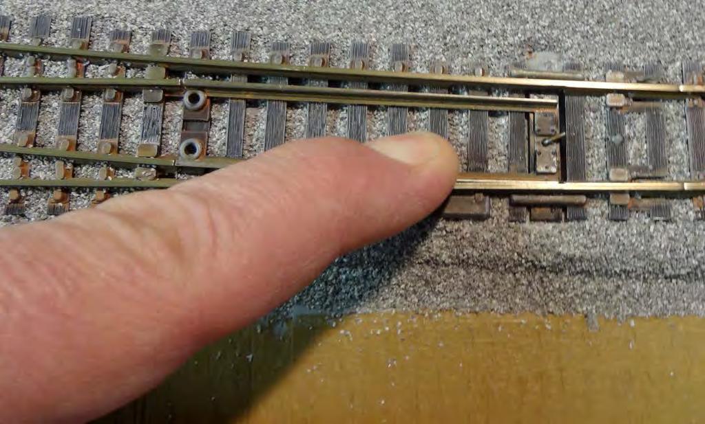 Ballasting Track Ensure the turnout moves freely in both directions.