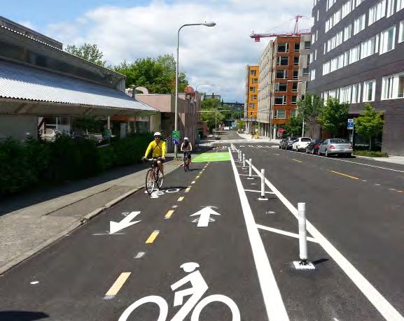 Separated Bike Lanes: Two-Way at Street Level This treatment provides an exclusive, bi-directional operating space for bicyclists between the street and sidewalk that is physically separated from