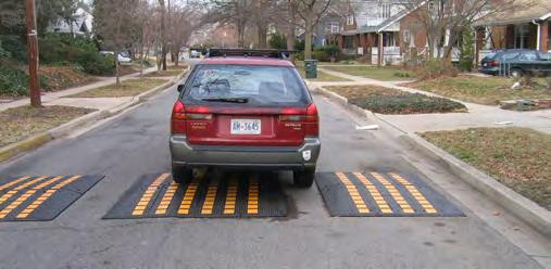 Traffic Calming via Raised Pavement Vertical traffic calming forces motorists to drive at slower speeds.