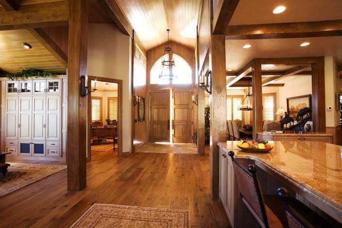 The hardwood floors are constructed of individually hand-planed, 8 oak planks engineered to withstand radiant heat; finish is Joshua Tree.