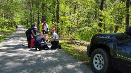 The rangers were the first on scene and established a safe route for the following first responders to effectively reach the injured cyclist.