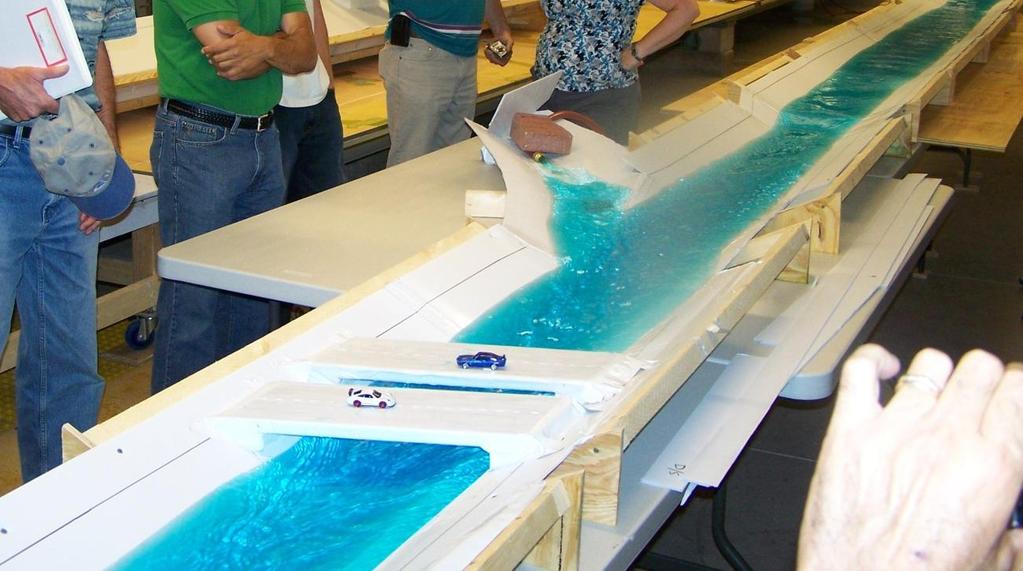 Velocity and water depth measurements are displayed in Table 1 to allow for comparison between the two scale models.