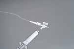 Pharmacy: ) Coiled Tube Infusor Filling Instructions: Remove paper tubing tape. Remove Winged Luer Cap. Retain Winged Luer Cap for later use. Remove the Fill Port Cap.