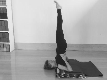 Parsva Bakasana From Malasana, turn as in Marichyasana III and hook the left upper arm to the outer right thigh. From here, place palms evenly as you did in Sirsasana II.
